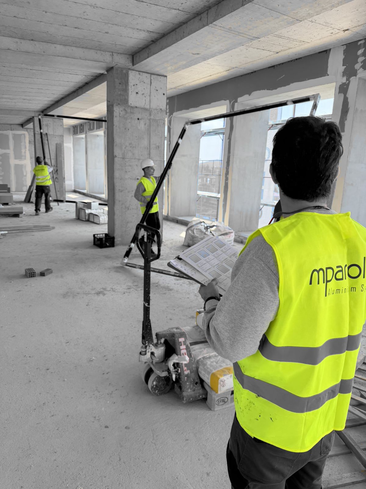 Quality control and installation planning for aluminium window systems during the MOB1 project by Mparolas Aluminium Systems.