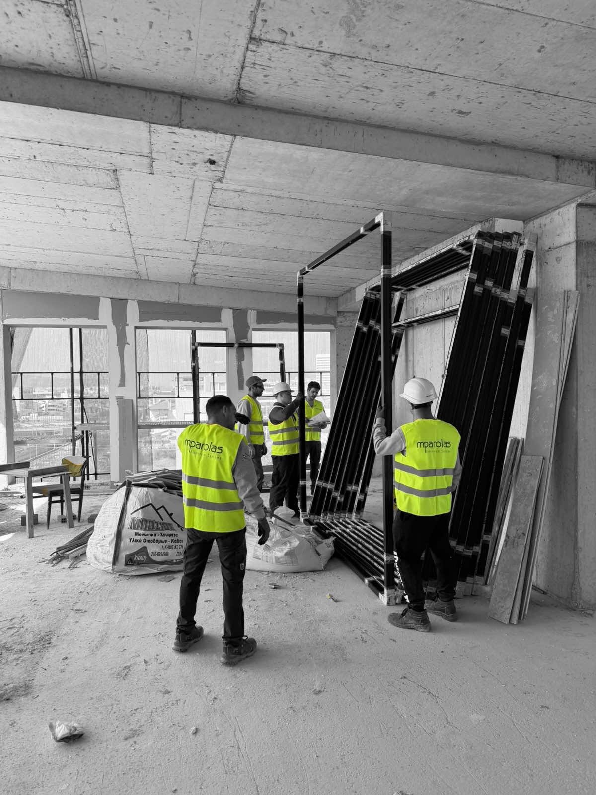 Large aluminium window frames prepared for installation at the MOB1 project by the Mparolas Aluminium Systems team.
