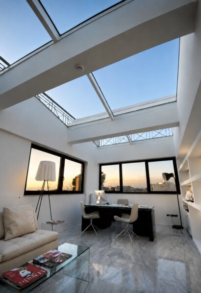 Award-winning minimal aluminium atrium skylight in Kifisia by Mparolas Aluminium Systems