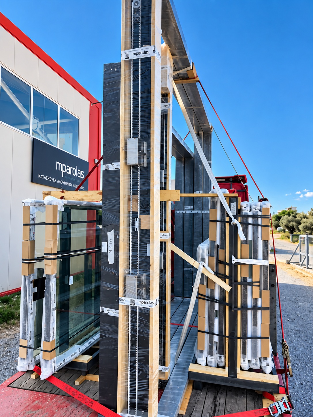 Aluminium windows and doors prepared for export loading from Mparolas factory to Brussels