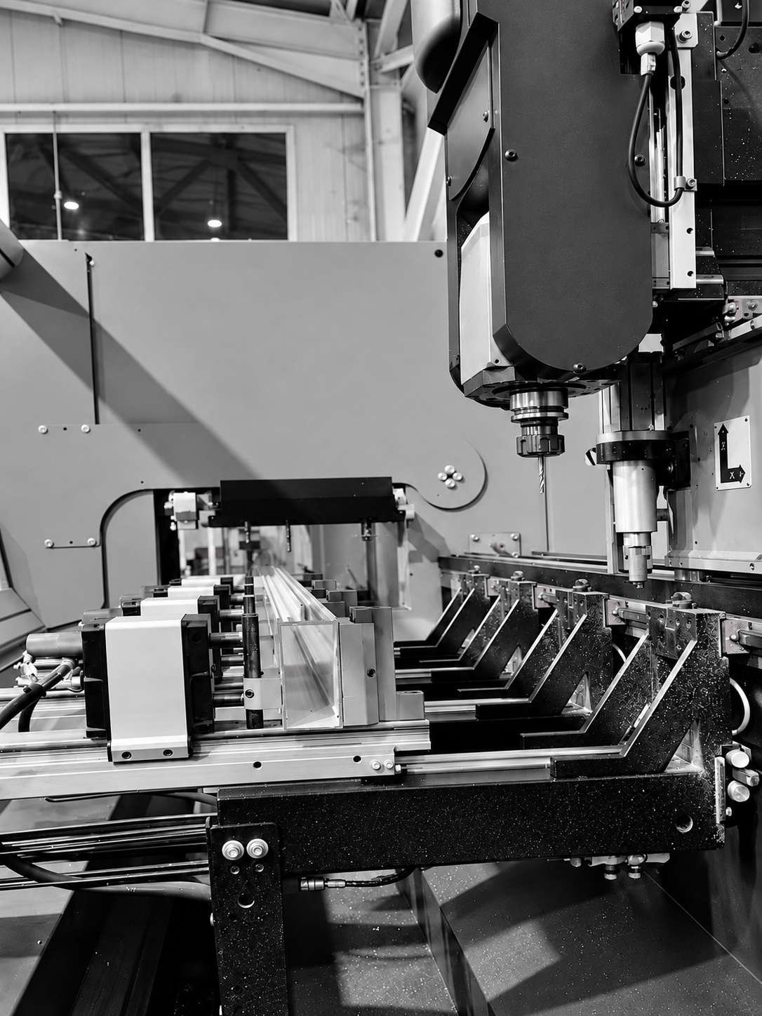 CNC machining of aluminium profiles for minimal sliding windows at Mparolas production facility