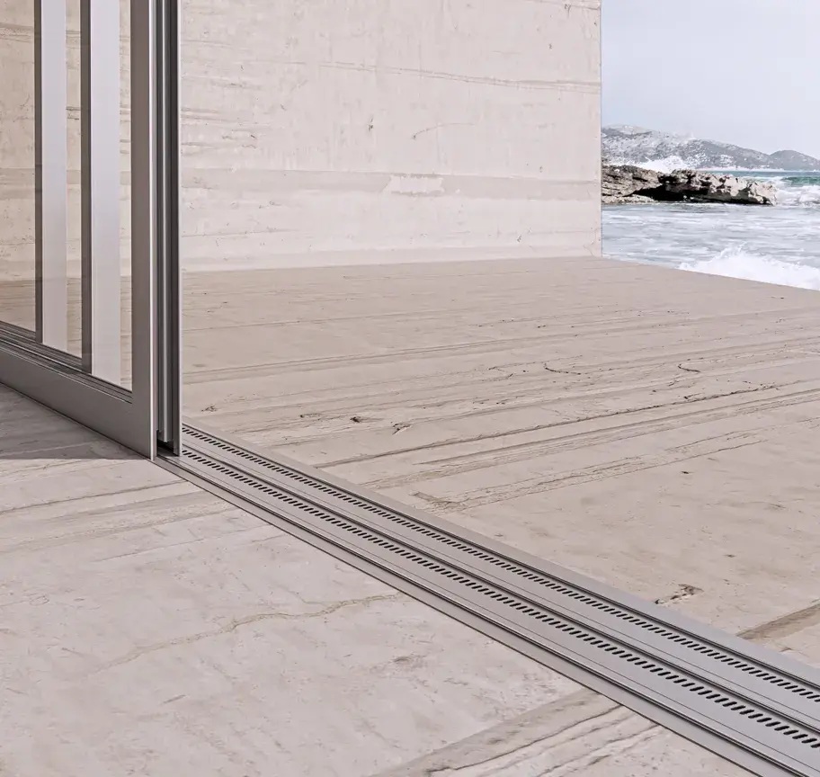 ELVIAL SL50 HI2 Classic flush sliding door threshold with integrated linear drainage and seamless transition between interior and exterior flooring